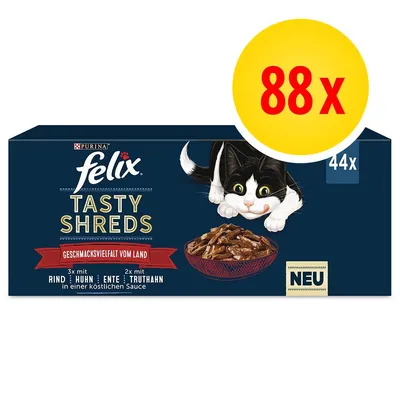 Boîte de sachets Felix Tasty Shreds, Purina, 44x. Grand cercle jaune avec texte rouge « 88x ». Texte en allemand sur la boîte. Illustration d’un chat et d’une gamelle de nourriture. Boîte de sachets Felix Tasty Shreds, Purina, 44x. Grand cercle jaune avec texte rouge « 88x ». Texte en allemand sur la boîte. Illustration d’un chat et d’une gamelle de nourriture.