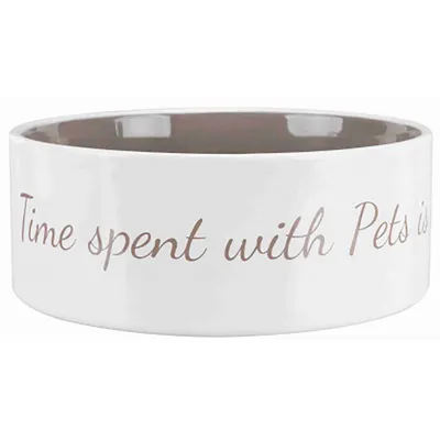 Biela miska na krmivo s nápisom 'Time spent with Pets is'.
