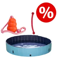 Lot avec piscine pour chien bleue, jouet KONG orange avec corde rouge et blanche, jouet à lancer rouge, symbole de réduction en haut à droite.