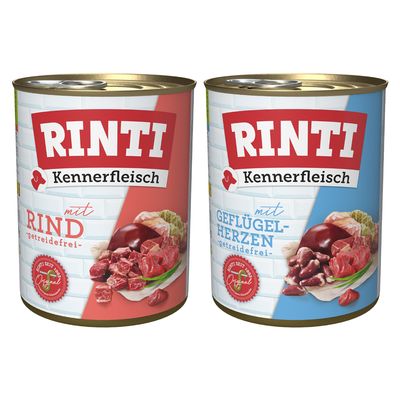RINTI Kennerfleisch 24x puszki: mit Schinken, mit Seefisch, mit Geflügelherzen, mit Wild. Widoczne opakowania z mięsem i rybą na etykietach.