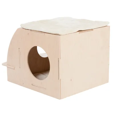 Domek ze dřeva s kulatým vchodem a měkkou béžovou plochou na ležení nahoře. Minimalistický design ze světlého dřeva.