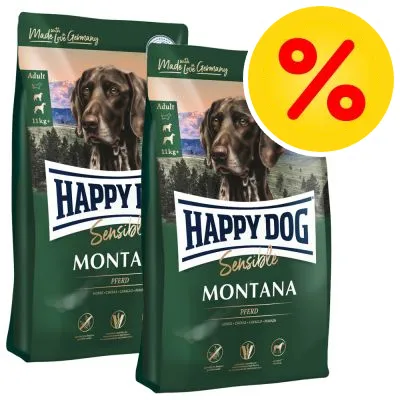 Två förpackningar Happy Dog Sensible Montana Adult 11 kg med gul rabatt-symbol (%) synlig. Text: Made with Love in Germany, Pferd.