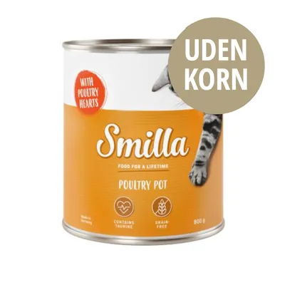 Smilla Poultry Pot dåse 800 g, tekst: WITH POULTRY HEARTS, FOOD FOR A LIFETIME, CONTAINS TAURINE, GRAIN-FREE, UDEN KORN. Del af kat synlig på etiketten.