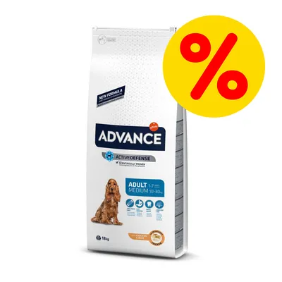 Saco de pienso Advance Active Defense Adult Medium 10–30 kg, pollo y arroz, 18 kg. Etiqueta de oferta con símbolo de porcentaje en amarillo y rojo.