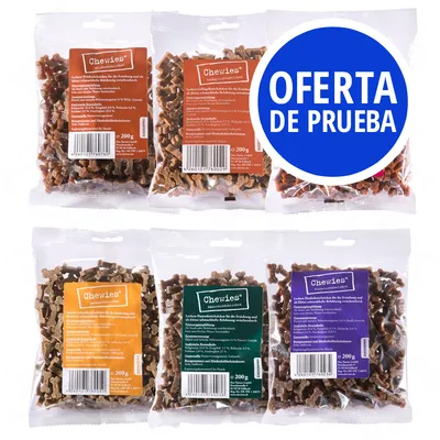 Seis bolsas de 200 g de snacks Chewies con etiquetas en varios colores y texto en alemán. Círculo azul con el texto: OFERTA DE PRUEBA.