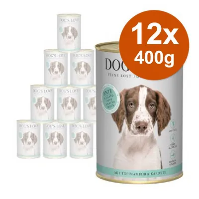 Confezione 12x400g DOG'S LOVE, alimento umido per cani, visibile scritta 'ENTE', con topinambur e carote. Immagine di cane sull'etichetta. Confezione 12x400g DOG'S LOVE, alimento umido per cani, visibile scritta 'ENTE', con topinambur e carote. Immagine di cane sull'etichetta.