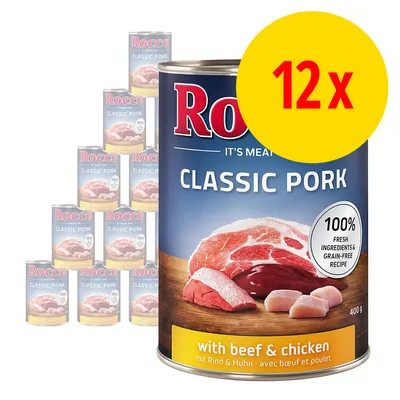 Rocco Classic Pork med oksekød og kylling, 12 x 400 g dåser. Tekst: 100% fresh ingredients & grain-free recipe, with beef & chicken.