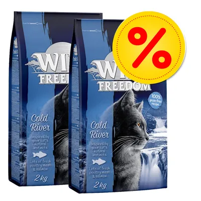 2 confezioni di Wild Freedom Cold River 2 kg, visibile scritta '100% grain-free recipe', immagine di gatto e simbolo percentuale rosso su sfondo giallo per offerta. 2 confezioni di Wild Freedom Cold River 2 kg, visibile scritta '100% grain-free recipe', immagine di gatto e simbolo percentuale rosso su sfondo giallo per offerta.