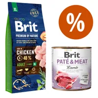 Confezione Brit Premium by Nature XL pollo 48% per cani adulti taglia grande e lattina Brit Paté & Meat agnello, simbolo percentuale arancione visibile.
