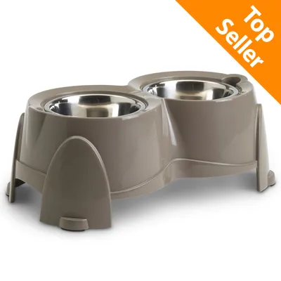 Ciotola doppia rialzata in plastica con due inserti in metallo. Angolo superiore destro: testo Top Seller su sfondo arancione.