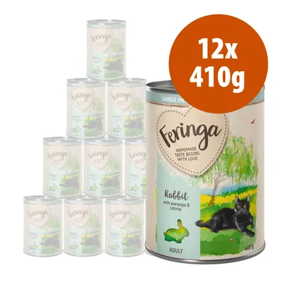 Feringa Rabbit with parsnips & catnip, confezione 12x410g per gatti adulti. Testo visibile: 'Homemade taste begins with love', immagine di un gatto nero su prato.