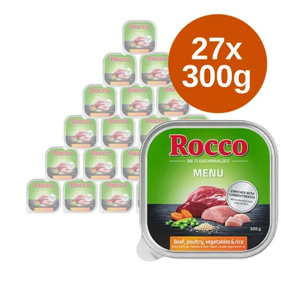 Rocco Menu, 27 x 300 g. Widoczne opakowanie: wołowina, drób, warzywa i ryż. Na etykiecie: „ENRICHED WITH CARBOHYDRATES”, „Beef, poultry, vegetables & rice”.