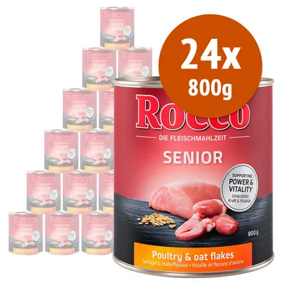 Confezione da 24 lattine Rocco Senior, 800 g ciascuna. Testo visibile: 'Poultry & oat flakes', 'Supporting power & vitality'. Immagine di carne e fiocchi d'avena sull'etichetta.