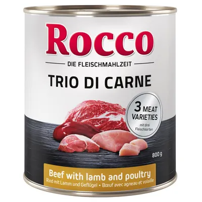 Conservă Rocco Trio di Carne, 800 g, carne de vită, miel și pasăre. Text vizibil: '3 meat varieties', 'Beef with lamb and poultry'. Imagine cu bucăți de carne.