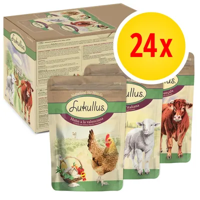 Lot de 24 sachets Lukullus pour chiens, variétés visibles : Huhn à la valenciana, Agneau à l’italiana, Bœuf à la provençale. Illustrations d’animaux sur chaque emballage.