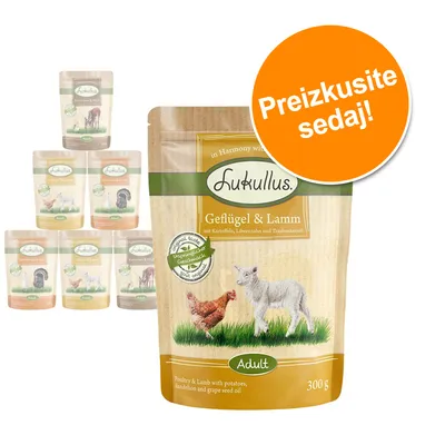 Lukullus Geflügel & Lamm Adult, 300 g. Več pakiranj v ozadju. Oranžen krog z besedilom: Preizkusite sedaj! Vidno tudi: mit Kartoffeln, Löwenzahn und Traubenkernöl.