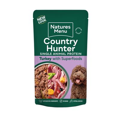 Country Hunter single animal protein turkey with superfoods, showing natural ingredients, no grain, hypoallergenic. Image includes food, raw ingredients, and a pet.