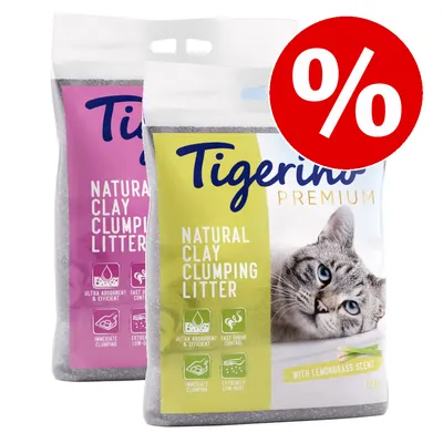 Tigerino Premium Natural Clay Clumping Litter, widoczne opakowania 12 kg z kotem i ikonami: ultra chłonny, szybka kontrola zapachu, natychmiastowe zbrylanie, bardzo mało pyłu. Symbol procentu.
