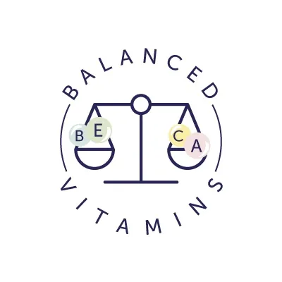 Texto en inglés: BALANCED VITAMINS. Dibujo de balanza con esferas que muestran BE, CA y A.