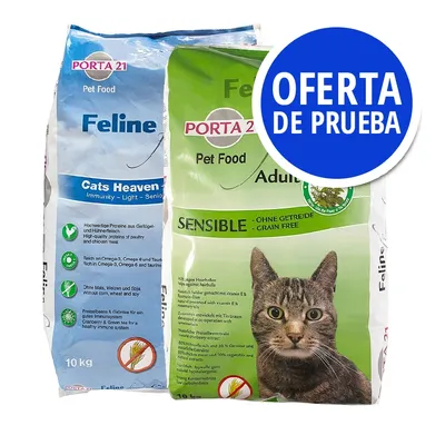 Dos sacos de pienso para gatos PORTA 21 Feline: uno azul 'Cats Heaven' y otro verde 'Adult Sensible', ambos con textos en inglés y alemán. Círculo azul: OFERTA DE PRUEBA.