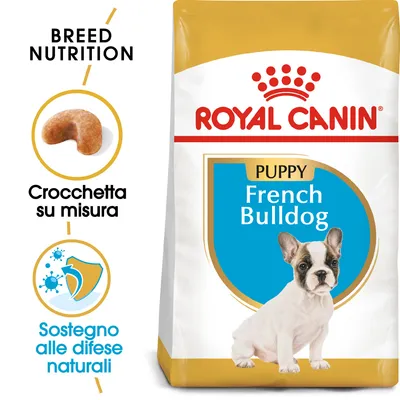 Confezione Royal Canin Puppy French Bulldog, scritte: 'Crocchetta su misura', 'Sostegno alle difese naturali', immagine di un cucciolo di bulldog francese e crocchetta.