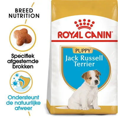Royal Canin Puppy Jack Russell Terrier hondenvoer, specifiek afgestemde brokken, ondersteunt de natuurlijke afweer. Verpakking met afbeelding van een puppy en merknaam duidelijk zichtbaar.