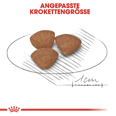 Три гранули суха храна с надпис на немски: ANGEPASSTE KROKETTENGRÖSSE и мащаб 1 см, показващ размера на гранулите.