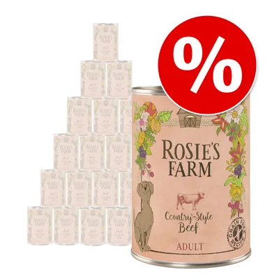 Latas de comida para perros Rosie's Farm Country-Style Beef Adult, receta sin cereales. Etiqueta con ilustraciones florales y símbolo de porcentaje en rojo indicando oferta o descuento.