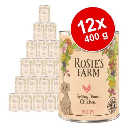 Rosie’s Farm Spring Dinner Chicken Puppy, 12 x 400 g. Widoczne puszki z etykietą: kurczak, bezzbożowa receptura, ilustracja psa i kwiatów.