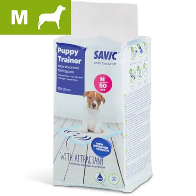 Savic Puppy Trainer super absorbent training pads, M 50 pcs, 45×30 cm. Billede af hvalp på underlag. Tekst: New improved version, with attractant, dry, 30 dage.