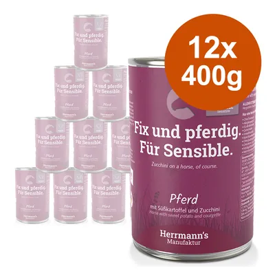 Herrmann's Manufaktur Fix und pferdig. Für Sensible. 12x400g blikken, smaak: paard met zoete aardappel en courgette. Tekst deels in het Duits en Engels zichtbaar op de verpakking.