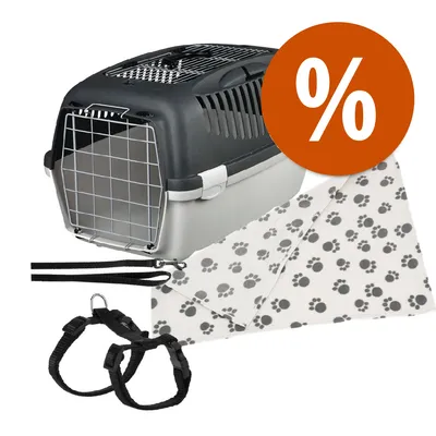 Set con trasportino in plastica e metallo, coperta bianca con impronte nere, pettorina e guinzaglio neri. Simbolo percentuale arancione indica offerta o sconto.