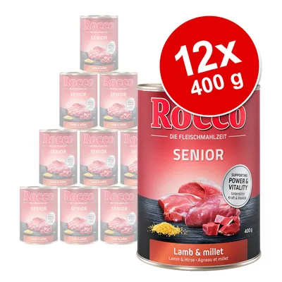 Rocco Senior Lamb & millet, 12 x 400 g dåser. Tekst på dåse: DIE FLEISCHMAHLZEIT, SUPPORTING POWER & VITALITY, Lamm & Hirse. Billede af kød og hirse på etiketten.