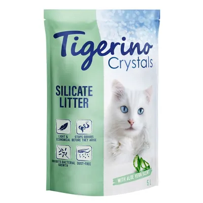 Opakowanie żwirku Tigerino Crystals Silicate Litter 5L z białym kotem, ikonami: lekki, ekonomiczny, zatrzymuje zapachy, hamuje rozwój bakterii, bezpyłowy, napis 'with aloe vera scent'.