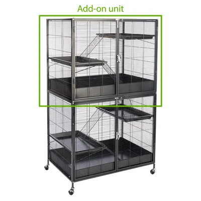 Extension supérieure de cage en métal avec deux portes, étagères et rampes, texte visible : Add-on unit. Partie encadrée en vert pour indiquer l’unité supplémentaire.