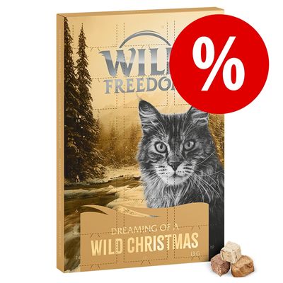 Wild Freedom Dreaming of a Wild Christmas adventskalender voor katten, afbeelding van kat en winterlandschap, rode procentteken-actie, zichtbare kattensnacks rechtsonder.