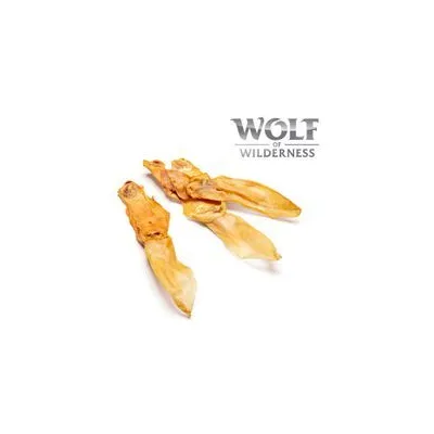 Friandises séchées Wolf of Wilderness, morceaux allongés de couleur beige clair, logo Wolf of Wilderness visible en haut à droite.