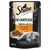 Sheba Delikatesse in Gelee mit Truthahn à la Dinde, sachet de 85 g, image d’un chat gris et d’une assiette de morceaux en gelée visibles sur l’emballage.