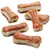 Bone-shaped chew treats with a light base and reddish-brown coating, shown in a group on a white background.