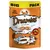 Sachet Dreamies BIG PACK 110g, friandises pour chats au poulet, mentionne « crunchy outside, soft inside », « bursting with 55+ servings per bag », illustrations de chats et poulet visibles. Sachet Dreamies BIG PACK 110g, friandises pour chats au poulet, mentionne « crunchy outside, soft inside », « bursting with 55+ servings per bag », illustrations de chats et poulet visibles.