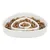 White feeding bowl with spiral design, filled with brown dry food pieces. Encourages slow eating through obstacles.