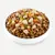 Bowl with dry food and fresh ingredients such as chicken, carrots, courgette and potatoes. Mix of kibble and natural pieces visible.