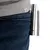 Silver-coloured laser pointer with wrist strap, attached to a trouser pocket.