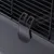 Close-up of a black plastic clip for attachment to a metal grid cage.