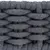 Close-up van een grijs, gevlochten textielmateriaal met dikke structuur.