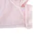 Close-up of pink fabric with press studs, possibly for a pet garment or accessory.
