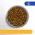 Bowl of dry pet food with brown and green kibble, turkey icon in top right corner, and age indication 1+ in yellow bar at bottom.