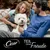 Cesar. Teil deine Freude. Werbung mit einem weissen Hund und zwei Personen im Hintergrund.