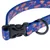 Collier bleu pour chien avec motifs Superman, boucle de fermeture en plastique noir et anneau métallique visible.