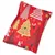 Coussin rectangulaire en tissu rouge décoré de motifs sapins de Noël, étoiles et baies blanches, jaunes, noires et rouges. Aucun texte ou marque visible.
